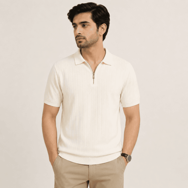 Drop needle Polo Off white Man wearing an off white half zip polo shirt in textured drop needle knit with beige chinos