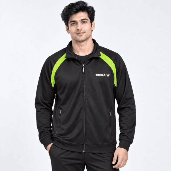 Tibhar plus size training jacket in black with green raglan shoulder panel, worn by model
