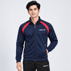Navy and Red Slim Raglan Tibhar raglan training jacket in navy with red shoulder panel, full zip, worn by model