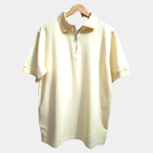 Sportlux Plus beige quarter zip polo front real photo Sportlux Plus beige quarter zip polo photographed on a hanger, front view showing the real fabric, off-white embroidered S and SPORTLUX PLUS neck label