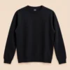 Sportlux Plus black crewneck sweatshirt, plain front, fine-knit rib collar, cuffs and waistband, flat lay on a light background