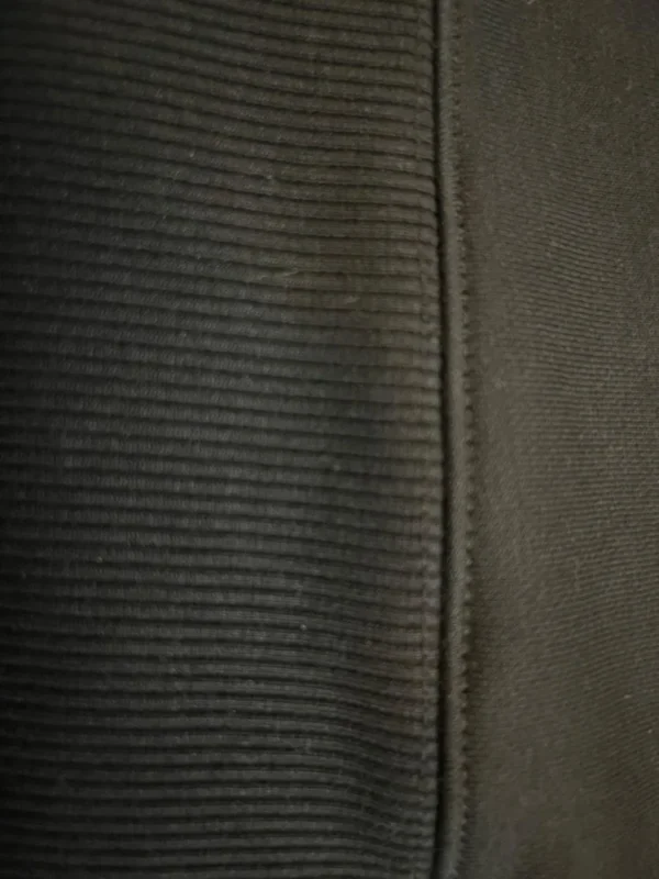 Close-up of the dense rib and clean stitching on the Sportlux Plus black fleece hoodie