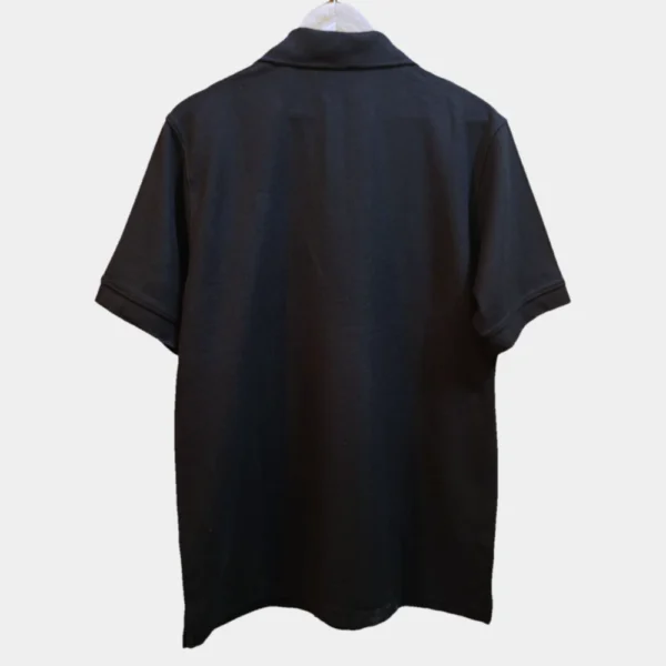 Sportlux Plus black quarter zip polo photographed on a hanger, back view showing the real fabric, ribbed sleeve bands and side vents