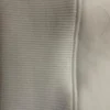 Close-up of the dense rib and clean stitching on the Sportlux Plus cream fleece hoodie
