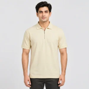 Man wearing the Sportlux Plus cream quarter zip polo in size Medium, front view, regular fit with room through the chest, silver metal zip and tonal S on the left chest