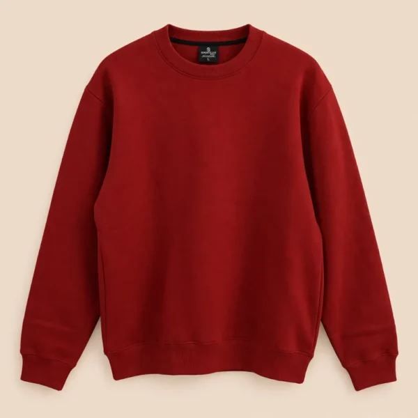 Sportlux Plus maroon crewneck sweatshirt, plain deep red front, fine-knit rib collar, cuffs and waistband, flat lay on a light background