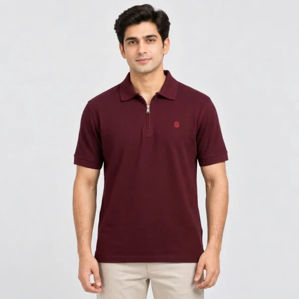 Man wearing a Sportlux Plus maroon quarter zip polo in fine cotton pique, front view, silver metal zip and red embroidered S on the left chest
