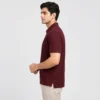Side view of the Sportlux Plus maroon quarter zip polo showing the regular fit, sleeve length and open side vent at the hem