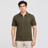 Man wearing a Sportlux Plus olive quarter zip polo in fine cotton pique, front view, silver metal zip and gold embroidered S on the left chest