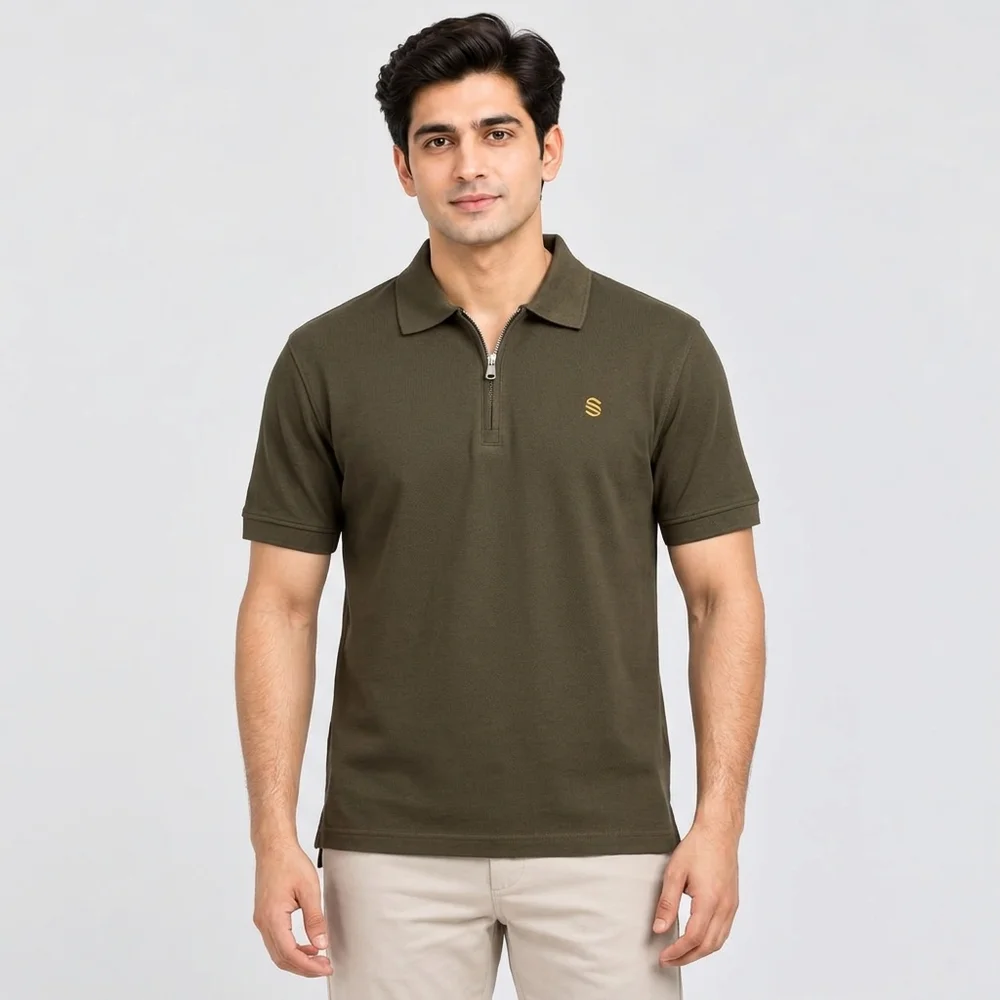 Man wearing a Sportlux Plus olive quarter zip polo in fine cotton pique, front view, silver metal zip and gold embroidered S on the left chest