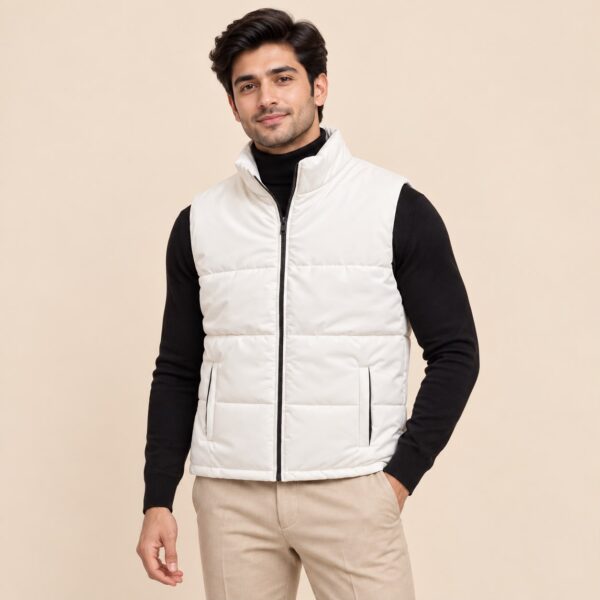 Man wearing a white sleeveless puffer jacket